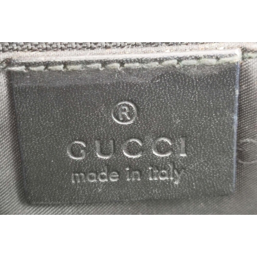 74 - GUCCI VINTAGE HANDBAG, monogram canvas with leather top handles and trims, push lock closure, silver... 