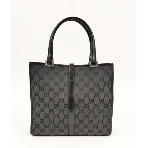 74 - GUCCI VINTAGE HANDBAG, monogram canvas with leather top handles and trims, push lock closure, silver... 