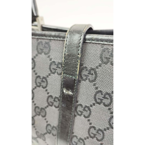 74 - GUCCI VINTAGE HANDBAG, monogram canvas with leather top handles and trims, push lock closure, silver... 