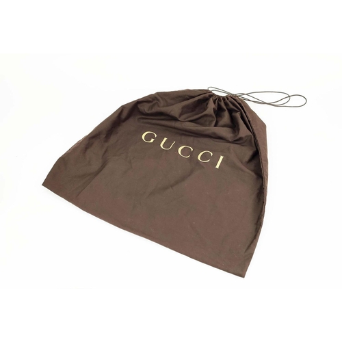 75 - GUCCI VINTAGE BAG, monogram canvas with bamboo handles and leather trims, studs detail, pale gilt me... 