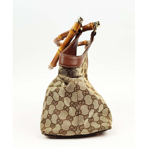 75 - GUCCI VINTAGE BAG, monogram canvas with bamboo handles and leather trims, studs detail, pale gilt me... 