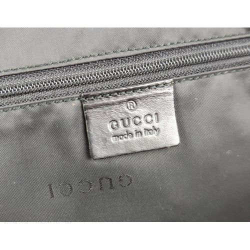 80 - GUCCI NYLON BAG, leather handle and trims, push lock closure, silver tone hardware, main open compar... 