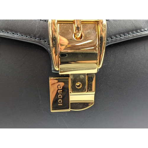 81 - GUCCI SYLVIE BAG, black leather with iconic web stripes and gold tone chain detailing on front flap,... 