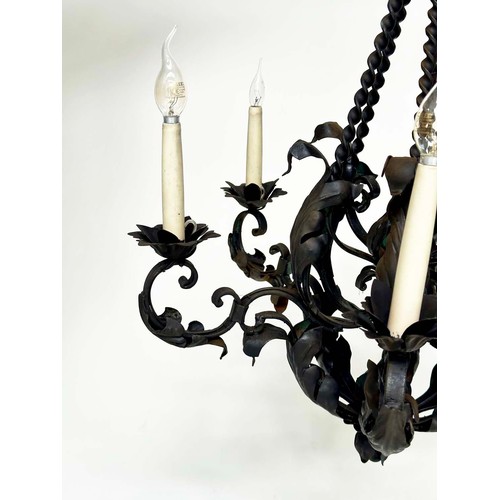 121 - CHANDELIER, scrolling and twisted wrought iron in antique finish with six candle lights, 73cm H.