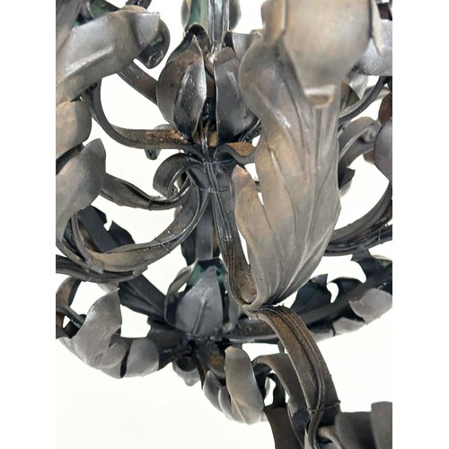 121 - CHANDELIER, scrolling and twisted wrought iron in antique finish with six candle lights, 73cm H.