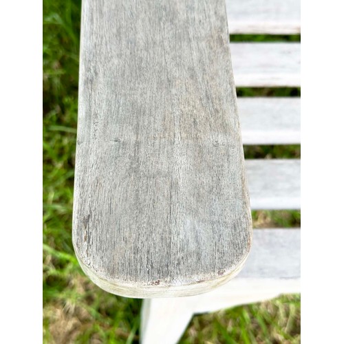 159 - GARDEN BENCH, weathered teak of slatted construction with flat top arms, 158cm W.