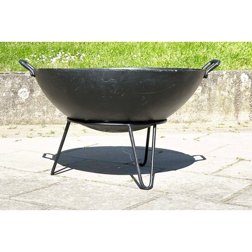 152 - INDIAN STYLE KADAI FIRE BOWL, heavy duty metal on stand, 79cm x 49cm H.