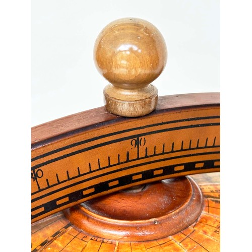 292 - GLOBE COCKTAIL CABINET, in the form of an antique terrestrial globe on stand with rising lid, and fi... 