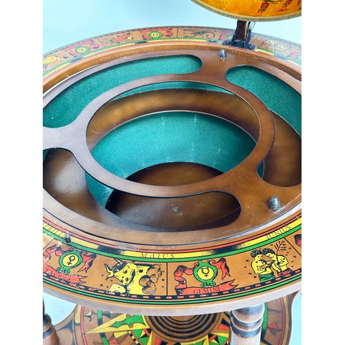 292 - GLOBE COCKTAIL CABINET, in the form of an antique terrestrial globe on stand with rising lid, and fi... 