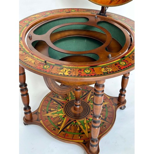 292 - GLOBE COCKTAIL CABINET, in the form of an antique terrestrial globe on stand with rising lid, and fi... 