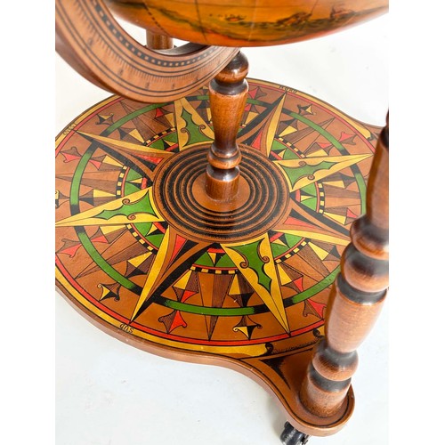292 - GLOBE COCKTAIL CABINET, in the form of an antique terrestrial globe on stand with rising lid, and fi... 