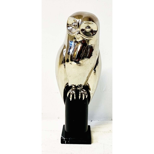 327 - CONTEMPORARY SCHOOL OWL SCULPTURE, polished metal on a marble stand, 44cm H.