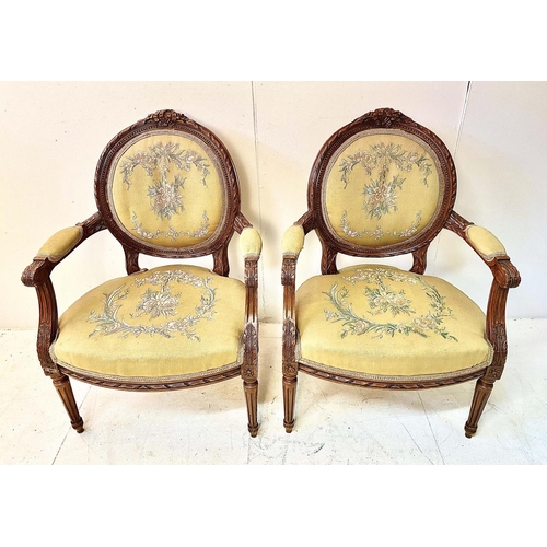 159 - FAUTEUILS, a pair, Louis XVI style, carved frames with embroidered upholstery, 91cm H x 63cm W x 55c... 