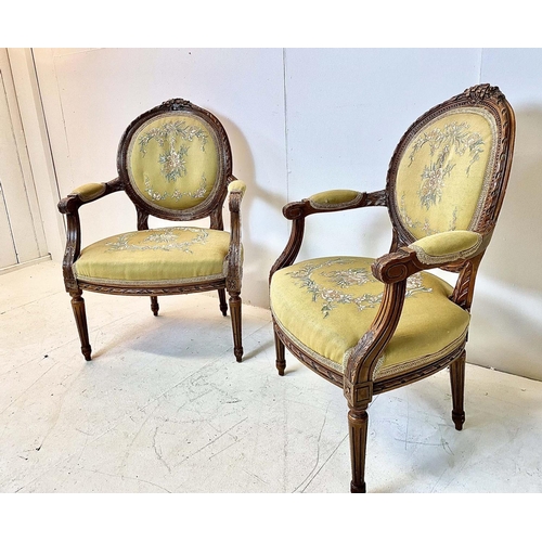 159 - FAUTEUILS, a pair, Louis XVI style, carved frames with embroidered upholstery, 91cm H x 63cm W x 55c... 