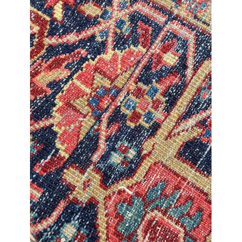 69 - ANTIQUE PERSIAN SERAPI CARPET, 346cm x 245cm.