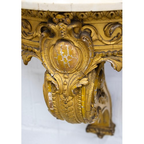 171 - WALL CONSOLE, Victorian, circa 1850, with a shaped marble top on a giltwood and gesso base, 79cm x 6... 