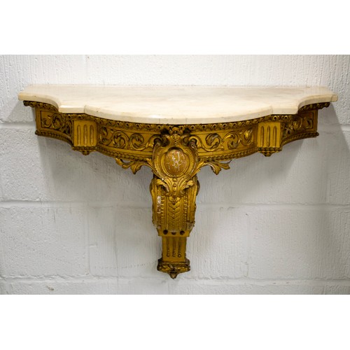 171 - WALL CONSOLE, Victorian, circa 1850, with a shaped marble top on a giltwood and gesso base, 79cm x 6... 