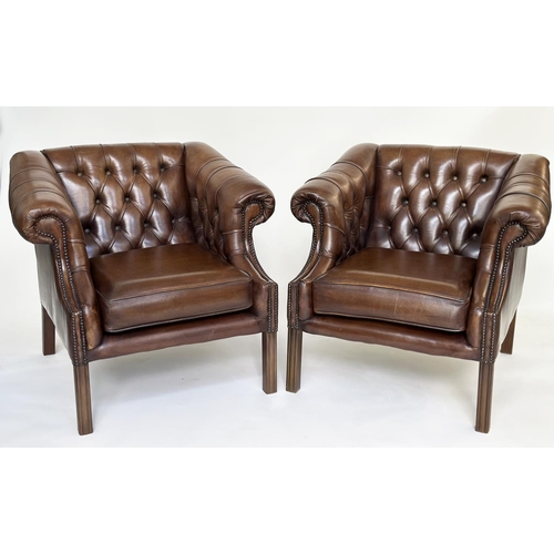 238 - LIBRARY ARMCHAIRS, a pair, Georgian style mahogany with deep button soft natural antique brown leath... 