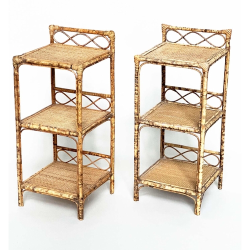 244 - SIDE TABLES, a pair, bamboo framed wicker panelled and cane bound, each with upstand and three tiers... 