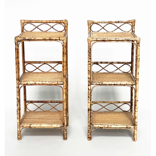 244 - SIDE TABLES, a pair, bamboo framed wicker panelled and cane bound, each with upstand and three tiers... 