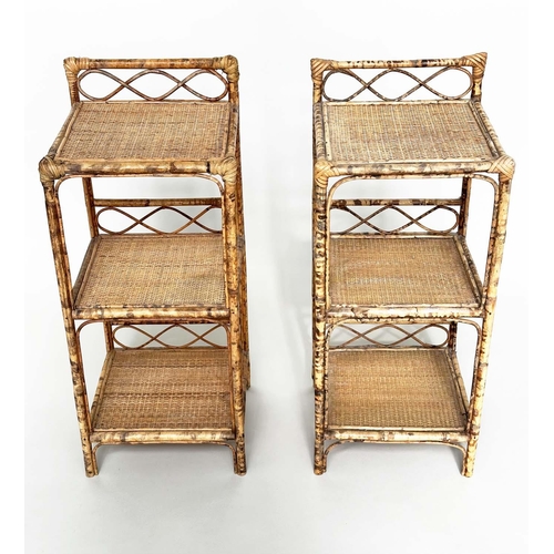 244 - SIDE TABLES, a pair, bamboo framed wicker panelled and cane bound, each with upstand and three tiers... 