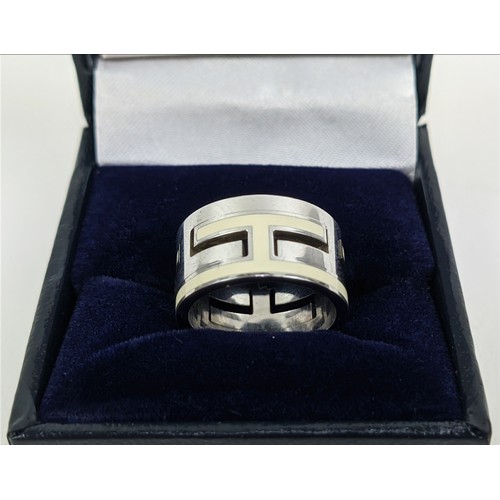 174 - A HERMES MOVE RING, sterling silver and enamelled ring size 'I', complete with box.