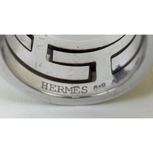 174 - A HERMES MOVE RING, sterling silver and enamelled ring size 'I', complete with box.