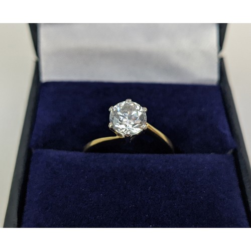 176 - AN 18CT GOLD SOLITAIRE STONE DRESS RING, the brilliant cut stone claw set in a white metal setting, ... 