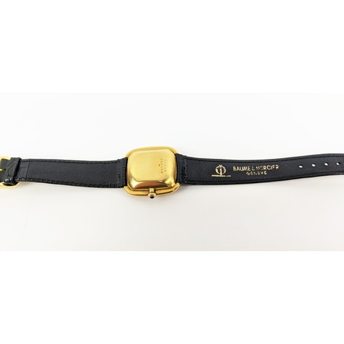 179 - A BAUME AND MERCIER WRISTWATCH, 18ct gold cased, black leather strap, calendar dial, Swiss made move... 