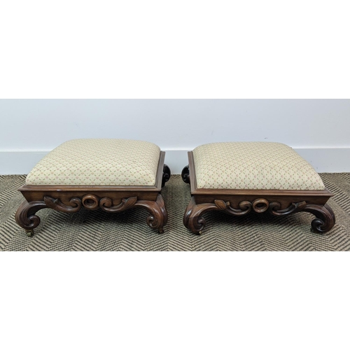 175 - FOOTSTOOLS, a pair, early Victorian rosewood with carved bases, on brass castors, each 46cm W x 46cm... 