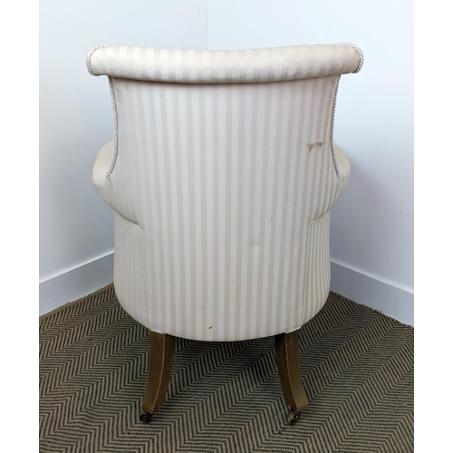 178 - LIBRARY BERGERE, Regency style mahogany in cream striped fabric on brass castors, 95cm H x 71cm.