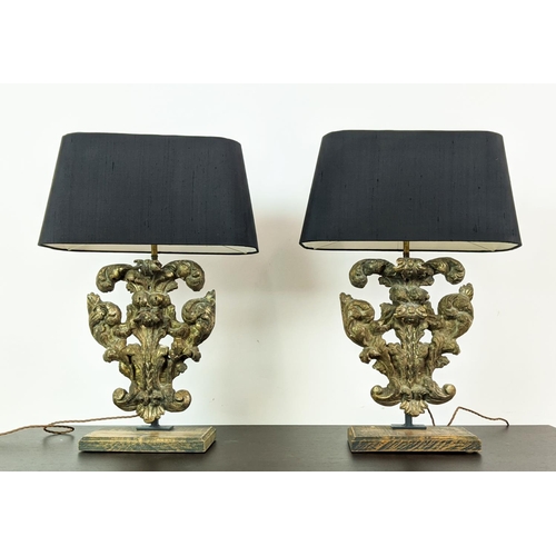 180 - TABLE LAMPS, a pair, carved giltwood bases with black shades, each 64cm tall overall including shade... 