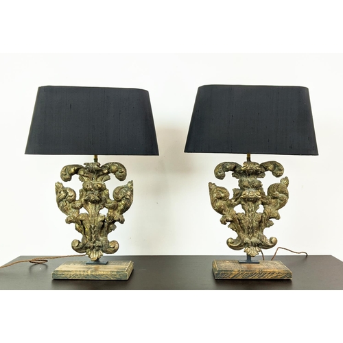 180 - TABLE LAMPS, a pair, carved giltwood bases with black shades, each 64cm tall overall including shade... 