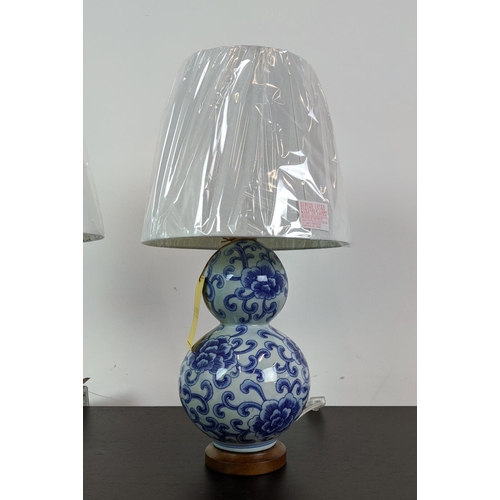 315 - LAUREN RALPH LAUREN HOME TABLE LAMPS, a pair, blue and white ceramic double gourd design, with shade... 