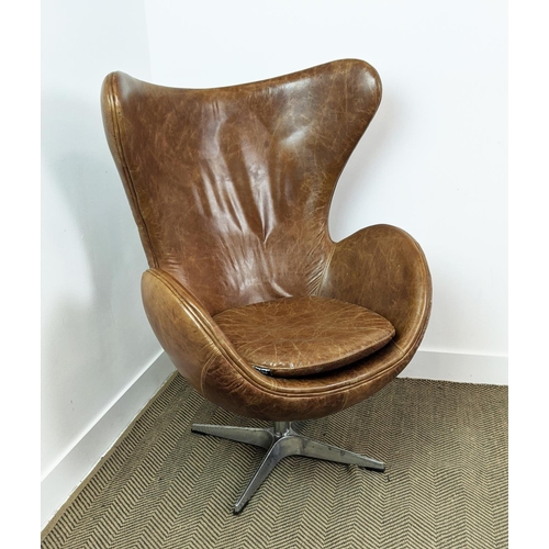 385 - AFTER ARNE JACOBSEN EGG STYLE CHAIR, brown leather, swivel action, 79cm W x 117cm H, by Artsome for ... 