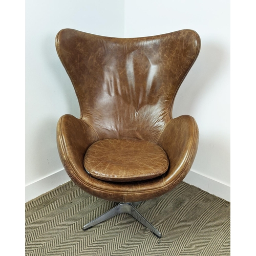 385 - AFTER ARNE JACOBSEN EGG STYLE CHAIR, brown leather, swivel action, 79cm W x 117cm H, by Artsome for ... 