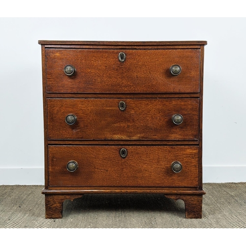 100 - CHEST, George III oak, with three drawers on later bracket feet, 86cm H x 76cm W x 46cm D.