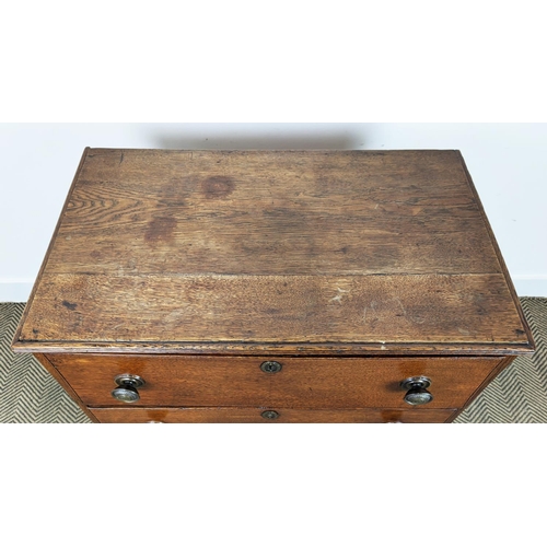 100 - CHEST, George III oak, with three drawers on later bracket feet, 86cm H x 76cm W x 46cm D.