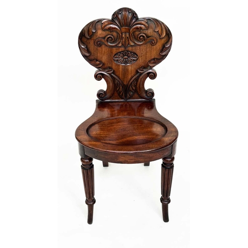 114 - HALL CHAIRS, a pair, Regency mahogany each with carved backs above oval recessed panel seats and out... 