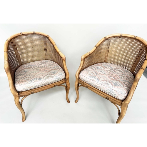 125 - FAUX BAMBOO CONSERVATORY ARMCHAIRS, a pair, with arched backs and cane panelling, 60cm W. (2)