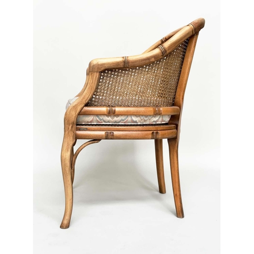 125 - FAUX BAMBOO CONSERVATORY ARMCHAIRS, a pair, with arched backs and cane panelling, 60cm W. (2)