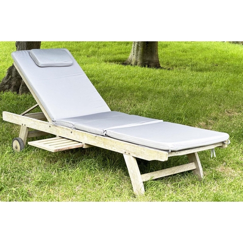 133 - GARDEN LOUNGER BY LINDSEY, nicely weathered teak multi folding slatted with wheels, drinks tray and ... 