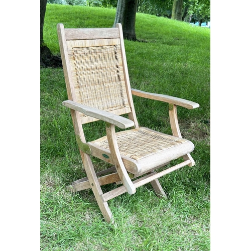 136 - 'WESTMINSTER' GARDEN/CONSERVATORY TERRACE FOLDING ARMCHAIRS, a pair, teak and brass hinged with cane... 