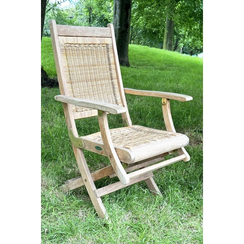 136 - 'WESTMINSTER' GARDEN/CONSERVATORY TERRACE FOLDING ARMCHAIRS, a pair, teak and brass hinged with cane... 