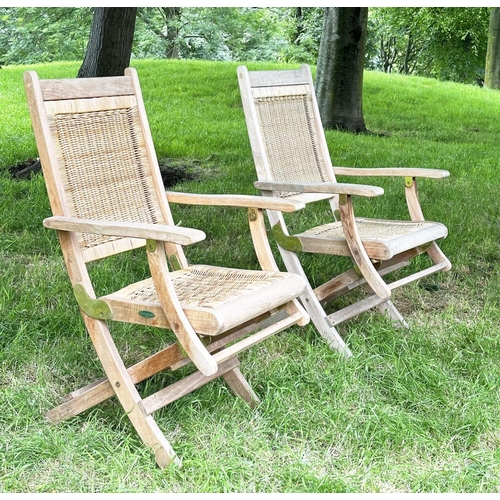 136 - 'WESTMINSTER' GARDEN/CONSERVATORY TERRACE FOLDING ARMCHAIRS, a pair, teak and brass hinged with cane... 