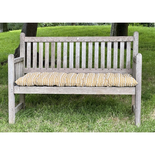 137 - GARDEN BENCH, vintage 'Lister' weathered teak with drop arms and cross slatted seat, 136cm W.