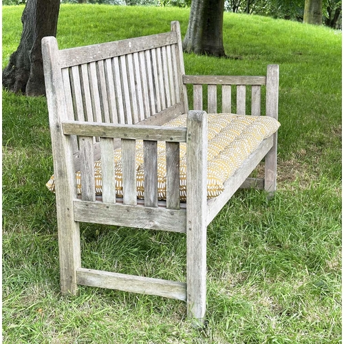 137 - GARDEN BENCH, vintage 'Lister' weathered teak with drop arms and cross slatted seat, 136cm W.