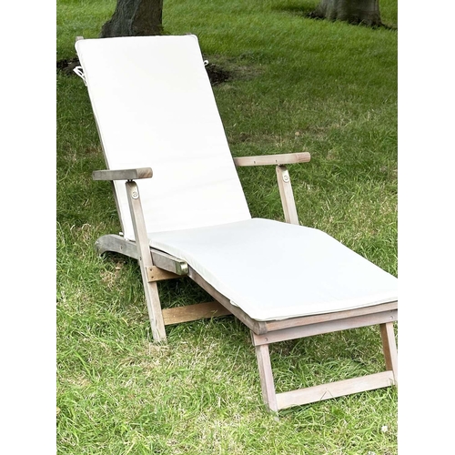 139 - STEAMER GARDEN ARMCHAIR, weathered teak and brass hinged folding slatted cosntruction, approx 144cm ... 