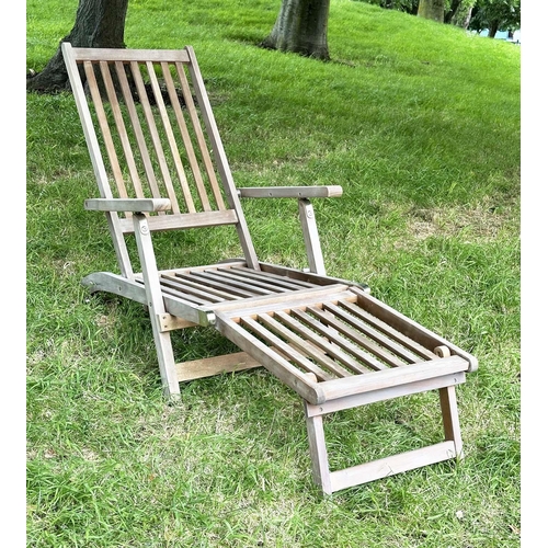 139 - STEAMER GARDEN ARMCHAIR, weathered teak and brass hinged folding slatted cosntruction, approx 144cm ... 