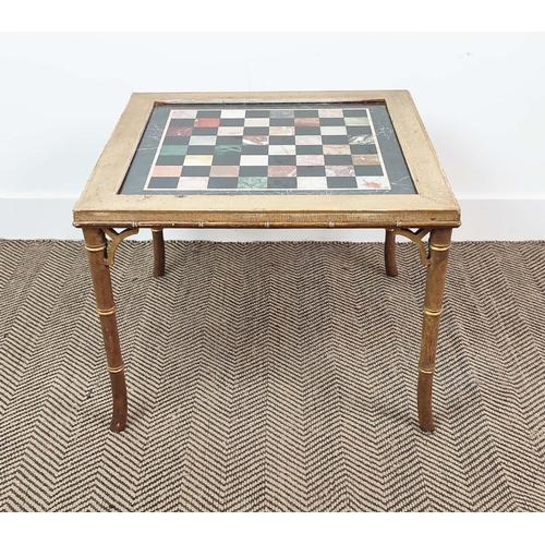 167 - LOW GAMES TABLE, Regency style giltwood and craquelure with inset specimen marble chessboard top on ... 